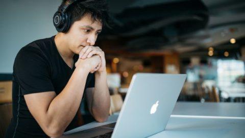 Man studying online at home