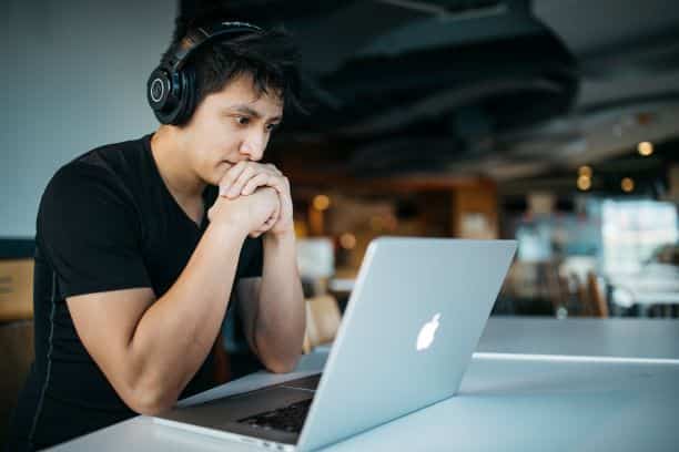 Man studying online at home