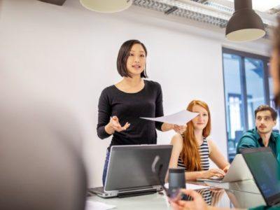 Women leading a team meeting