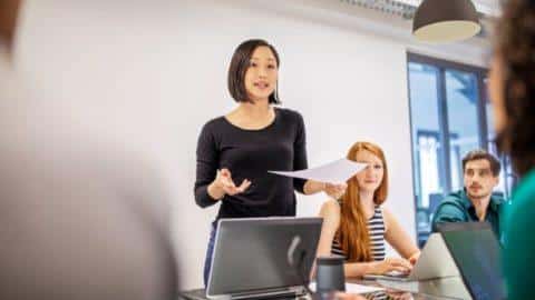 Women leading a team meeting