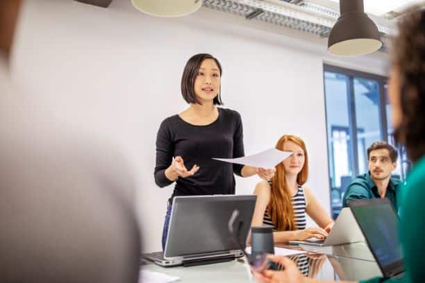 Women leading a team meeting