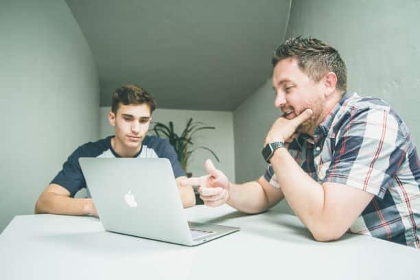 Two men in a meeting together